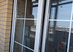 Штульповая балконная дверь из ПВХ-профиля 70 мм. Внутренние шпроссы. mobile